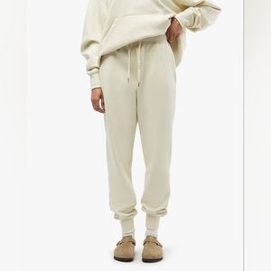 We wore what burnout fleece joggers in Ecru cream color. Medium. NWT